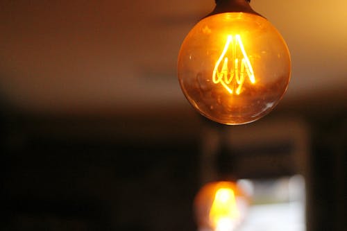 Selective Focus Photography of Turned on Light Bulb