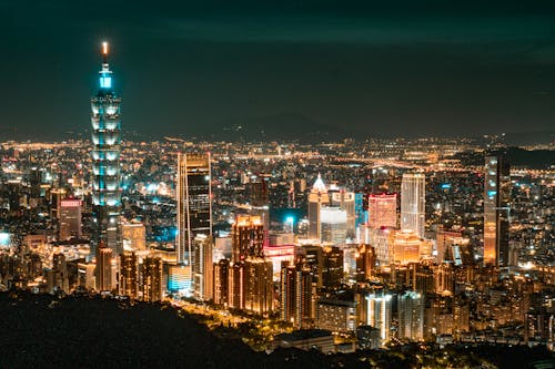 Free City with Futuristic Skyscrapers at Nighttime Stock Photo