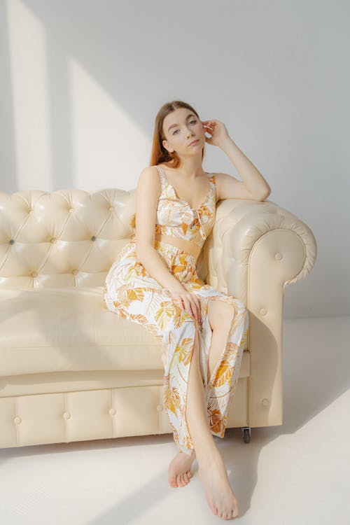 Woman in Dress on Couch