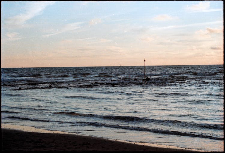 Framed Picture Of Sea On Sunset