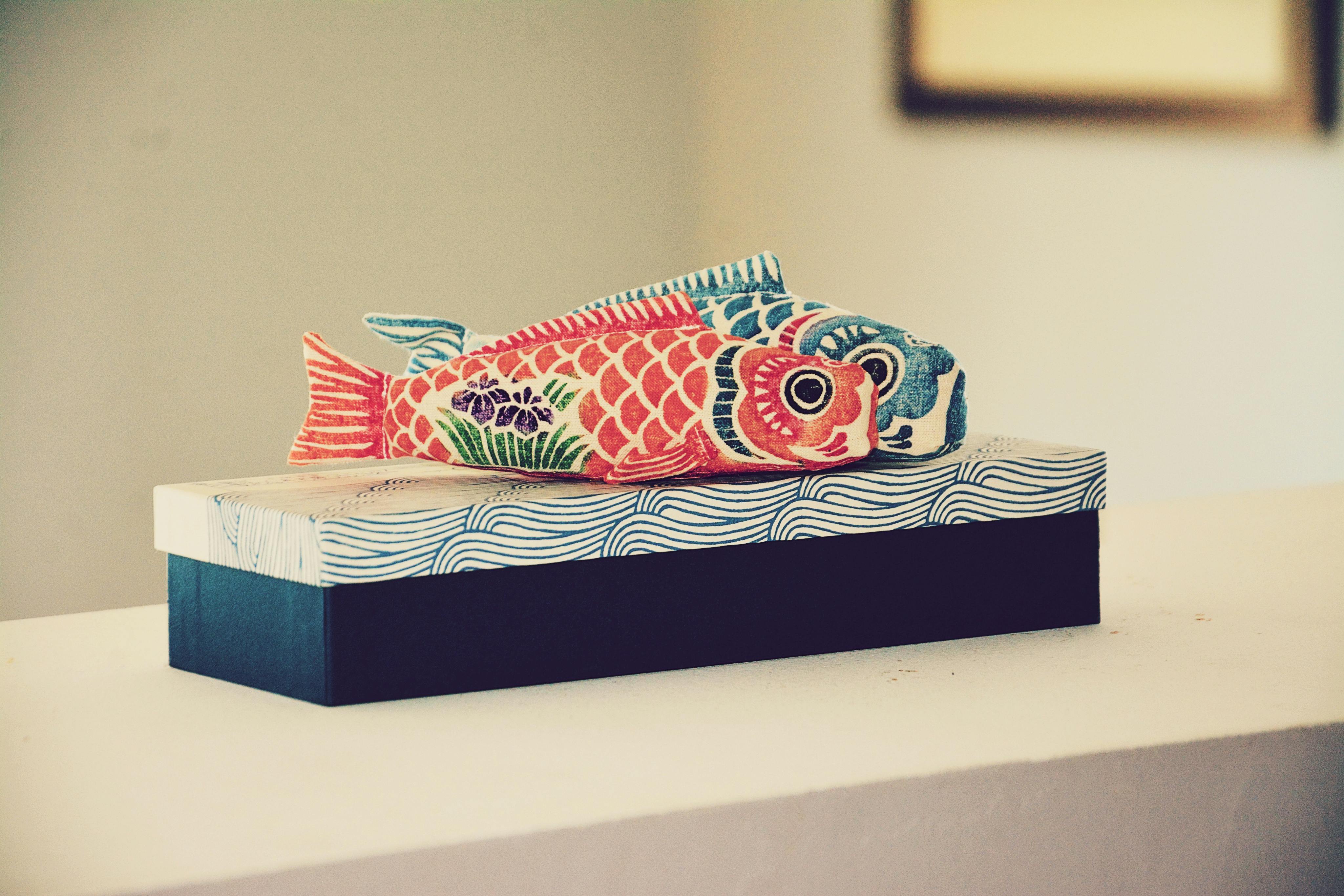 Japanese Decorative Fish Toys on Box · Free Stock Photo