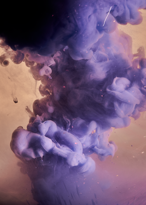 Free Dynamic close-up of vivid purple smoke swirling in water, creating an abstract art piece. Stock Photo