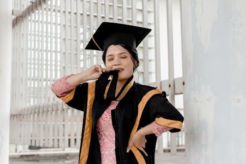 A Woman in Academic Dress and Academic Hat