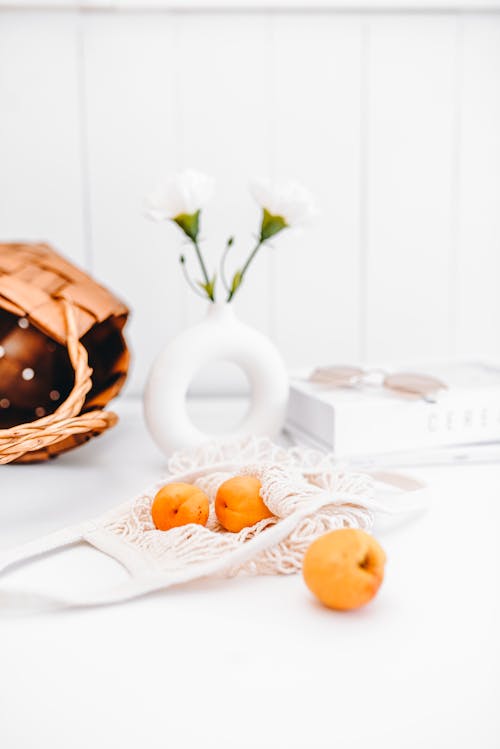 Free Still Life Photo with Tangerines and a Vase Stock Photo