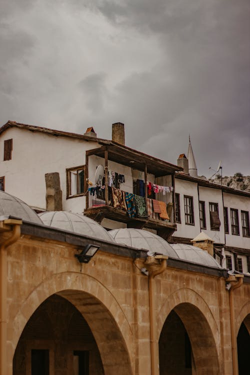 Clothes Hanging on the Wooden Balcony 