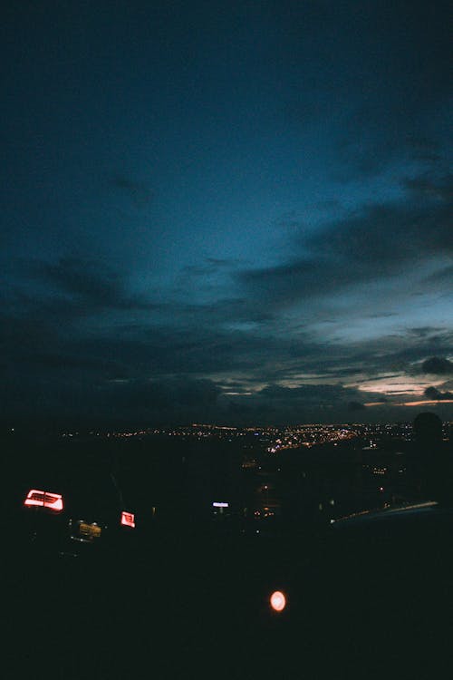 Free stock photo of aesthetic, city at night, clouds Stock Photo
