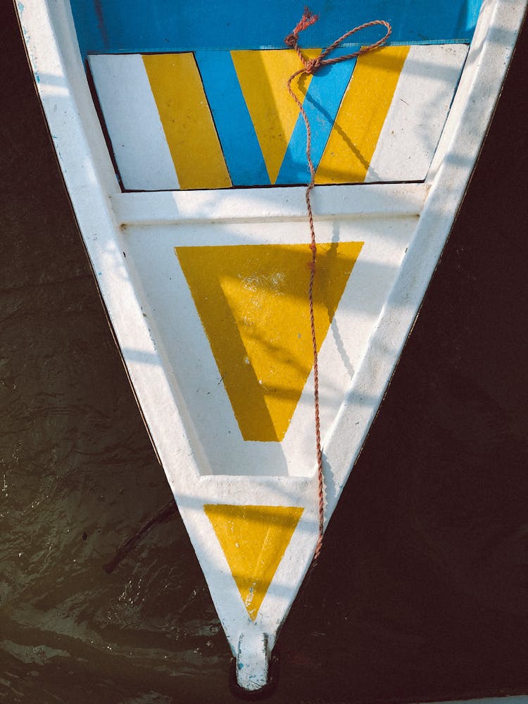 Photo Of A Boat Stern In Yellow, Blue And White Pattern