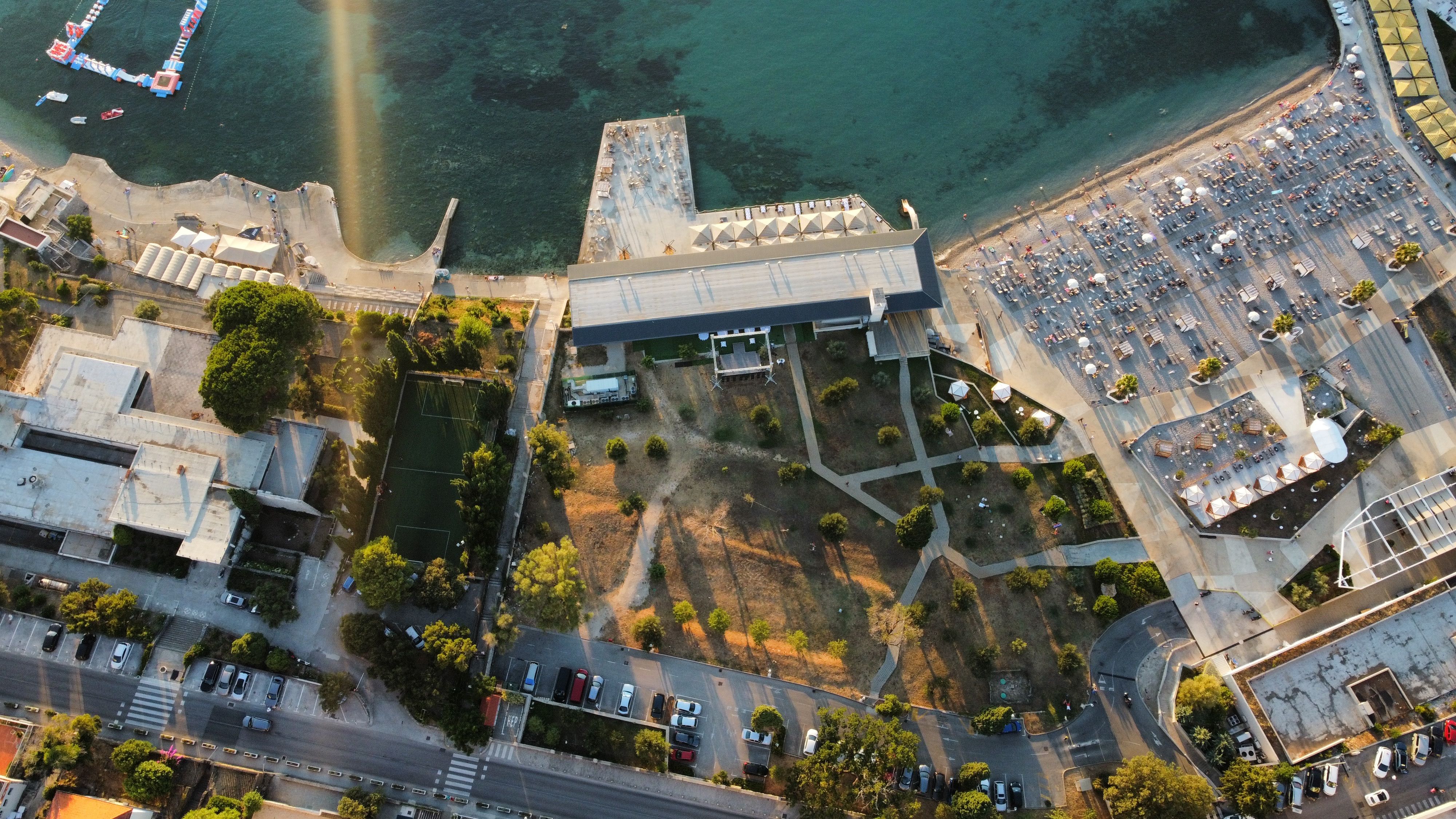 Copacabana Beach on Babin Kuk peninsula with pine trees and clear Adriatic water