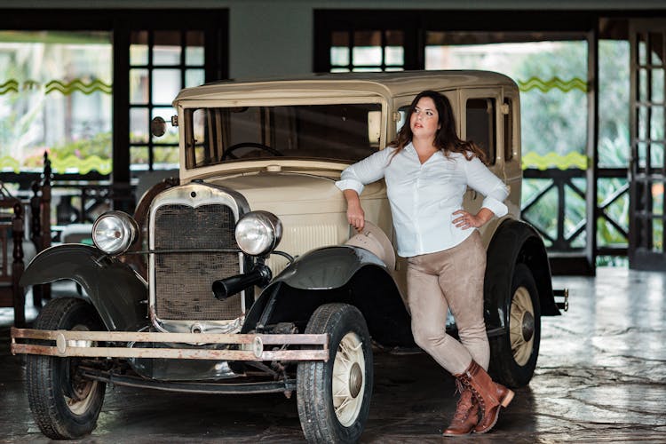 Woman Posing Near Retro Car