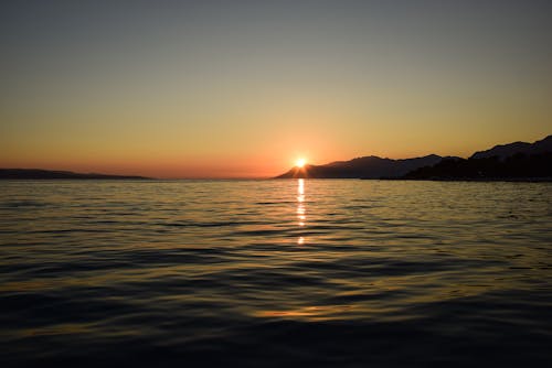 無料 シースケープ, ビーチ, 夕日の無料の写真素材 写真素材