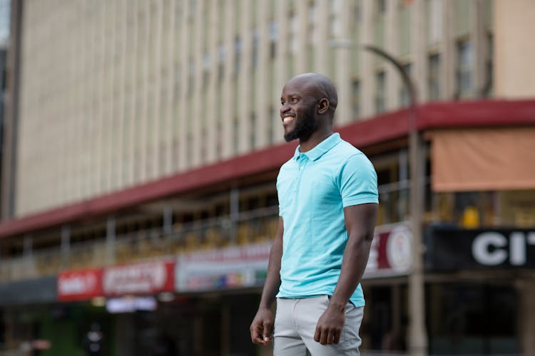 Man Wearing Blue Polo Shirt