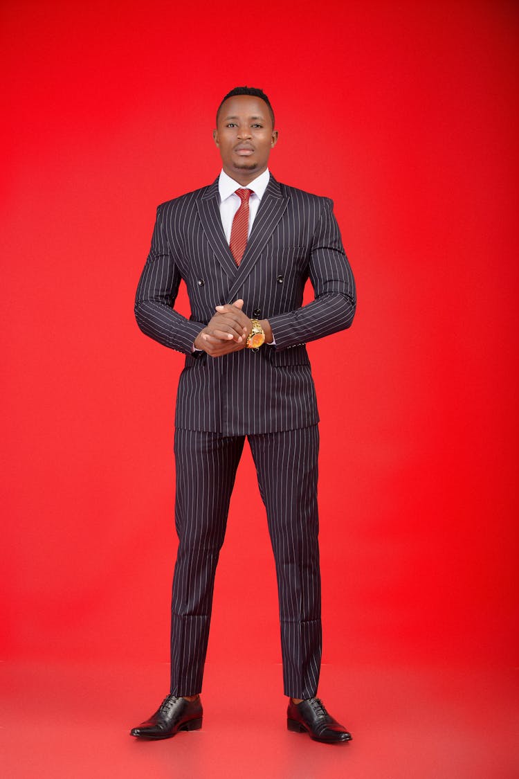 Elegant Man In Suit In Studio