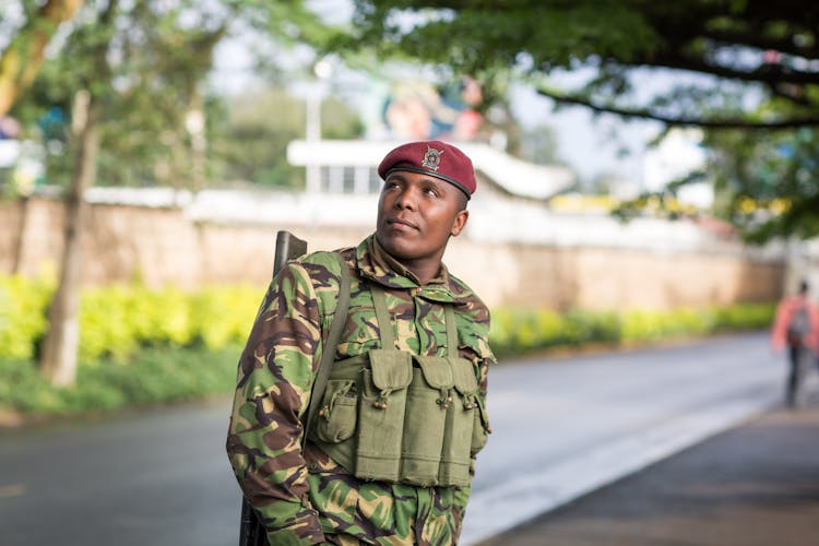 Close-up Photo Of Soldier In Military Uniform 