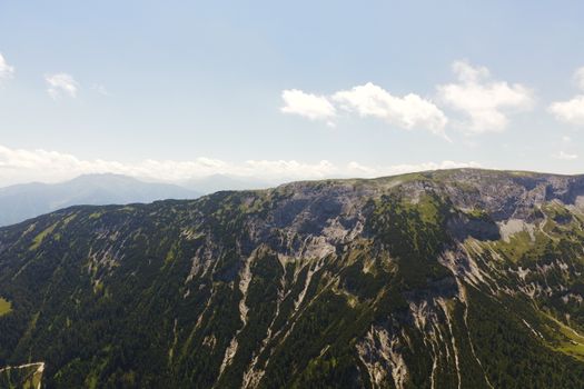 Stunning aerial view of rugged mountains in Tyrol, Austria during summer.
