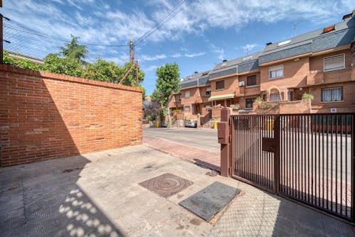 Brown Brick Houses in a Neighborhhood 