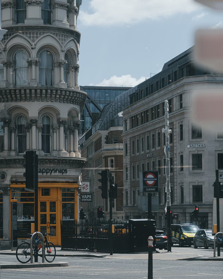 A Streets In London Between Concrete Buildings