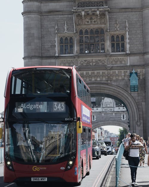 Close-Up Photo of Red London Bus on the Road 