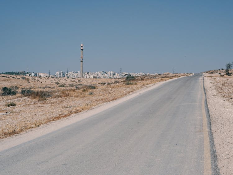 Gray Asphalt Road Under Blue Sky