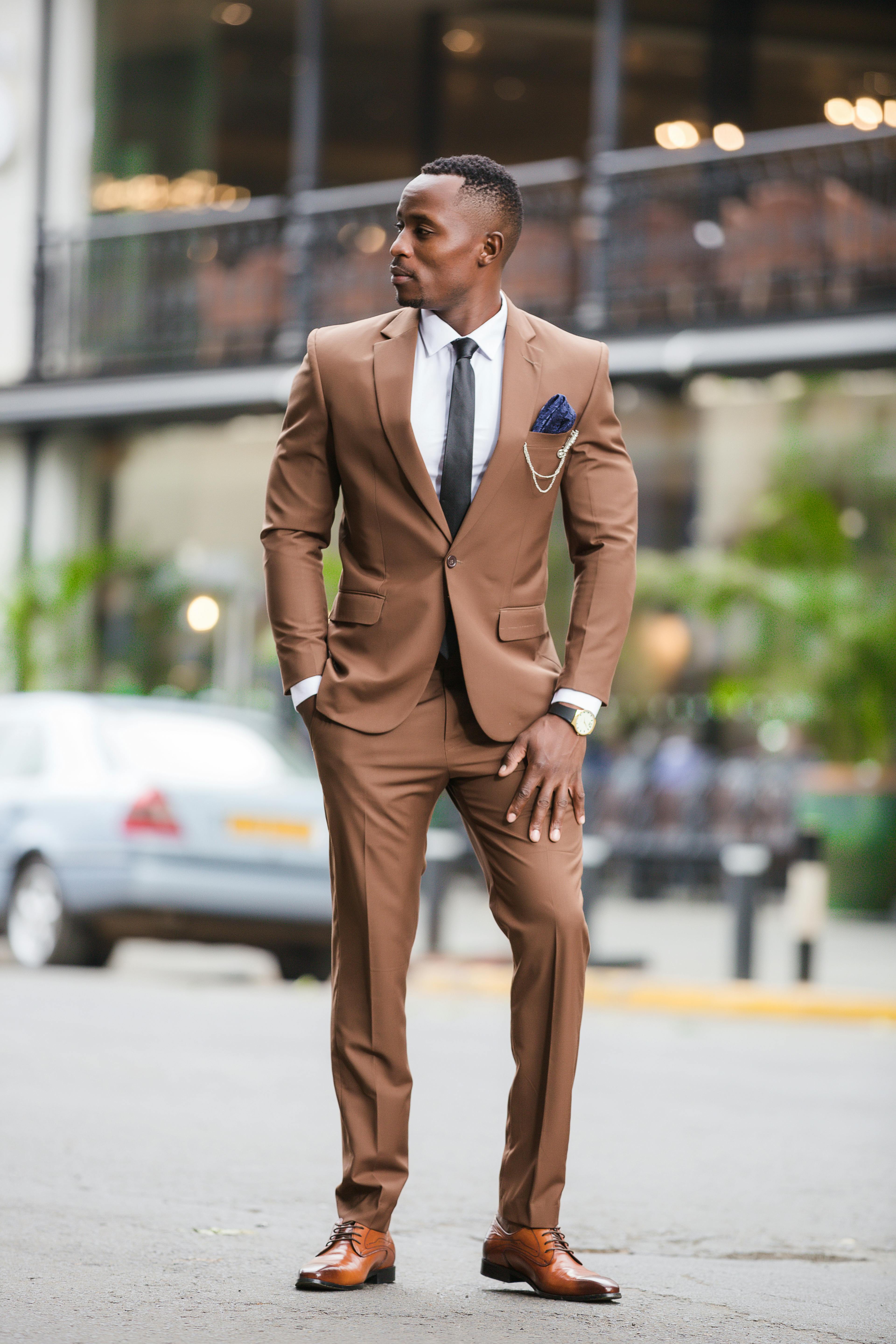 brown coat pant with black shirt