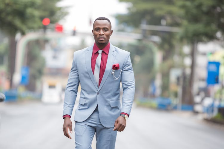 Man In Gray Suit And Red Long Sleeves 