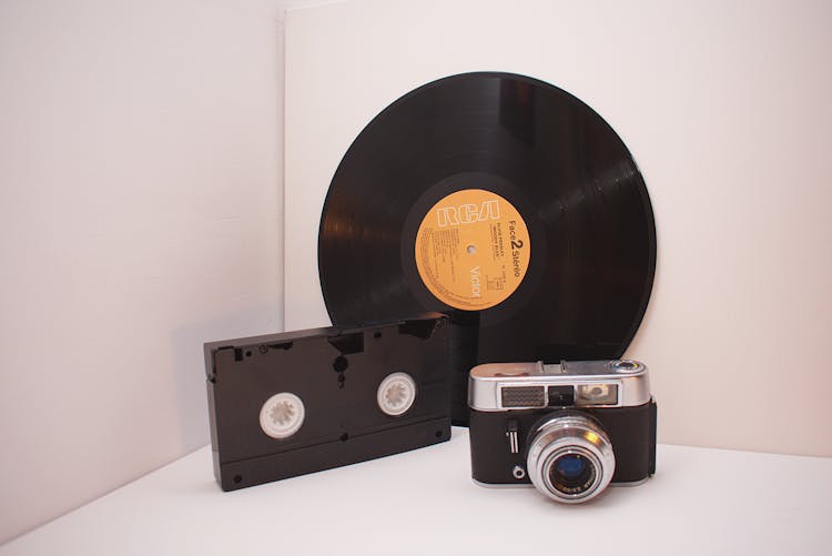 Black Vinyl Disc, Black Vhs Tape And Camera