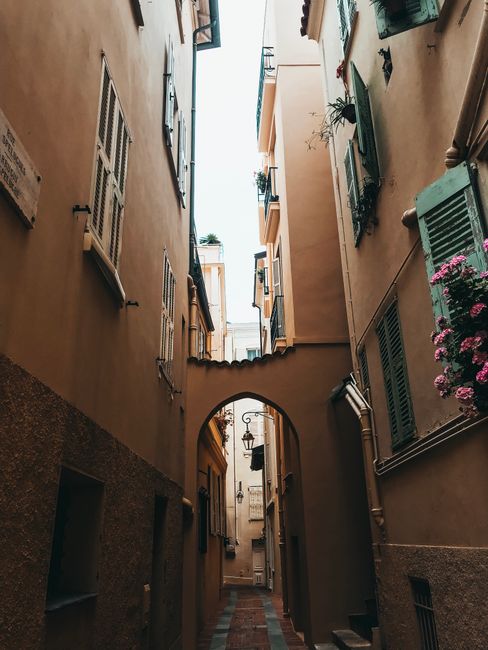 Explore the rustic charm of Monaco's old town with narrow alleys and historic facades.
