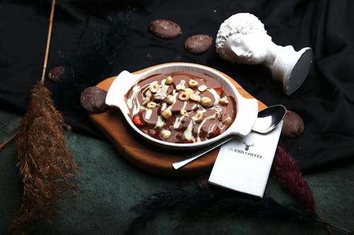 White Ceramic Bowl With Food on Brown Wooden Tray