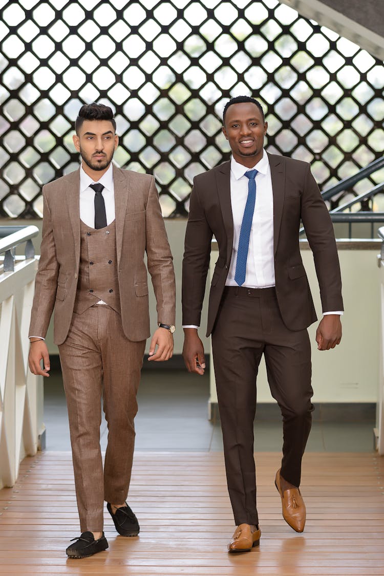 Men Wearing Suits Walking Together