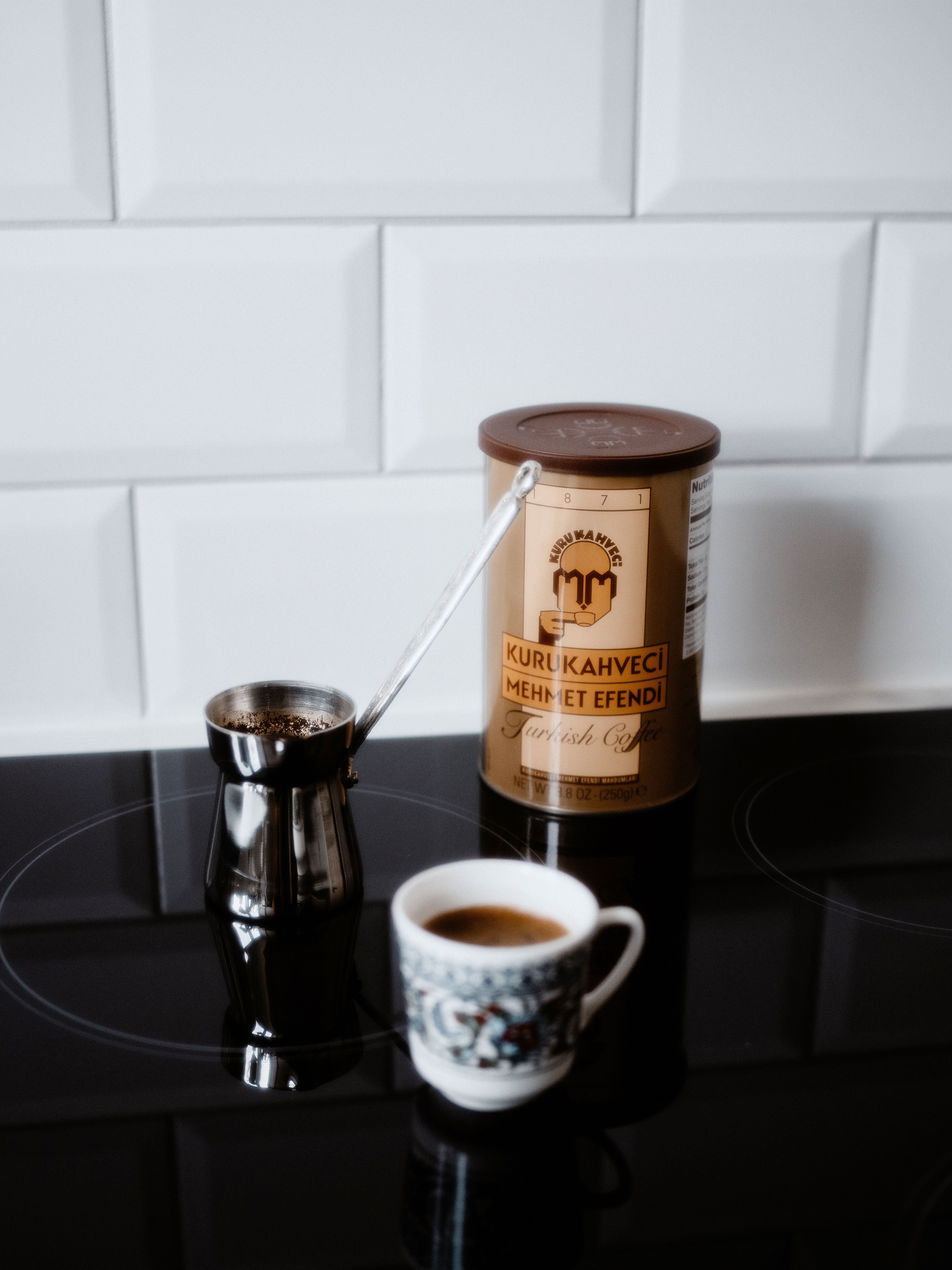 A stylish Turkish coffee setup with a cezve and decorated cup, ideal for morning rituals.