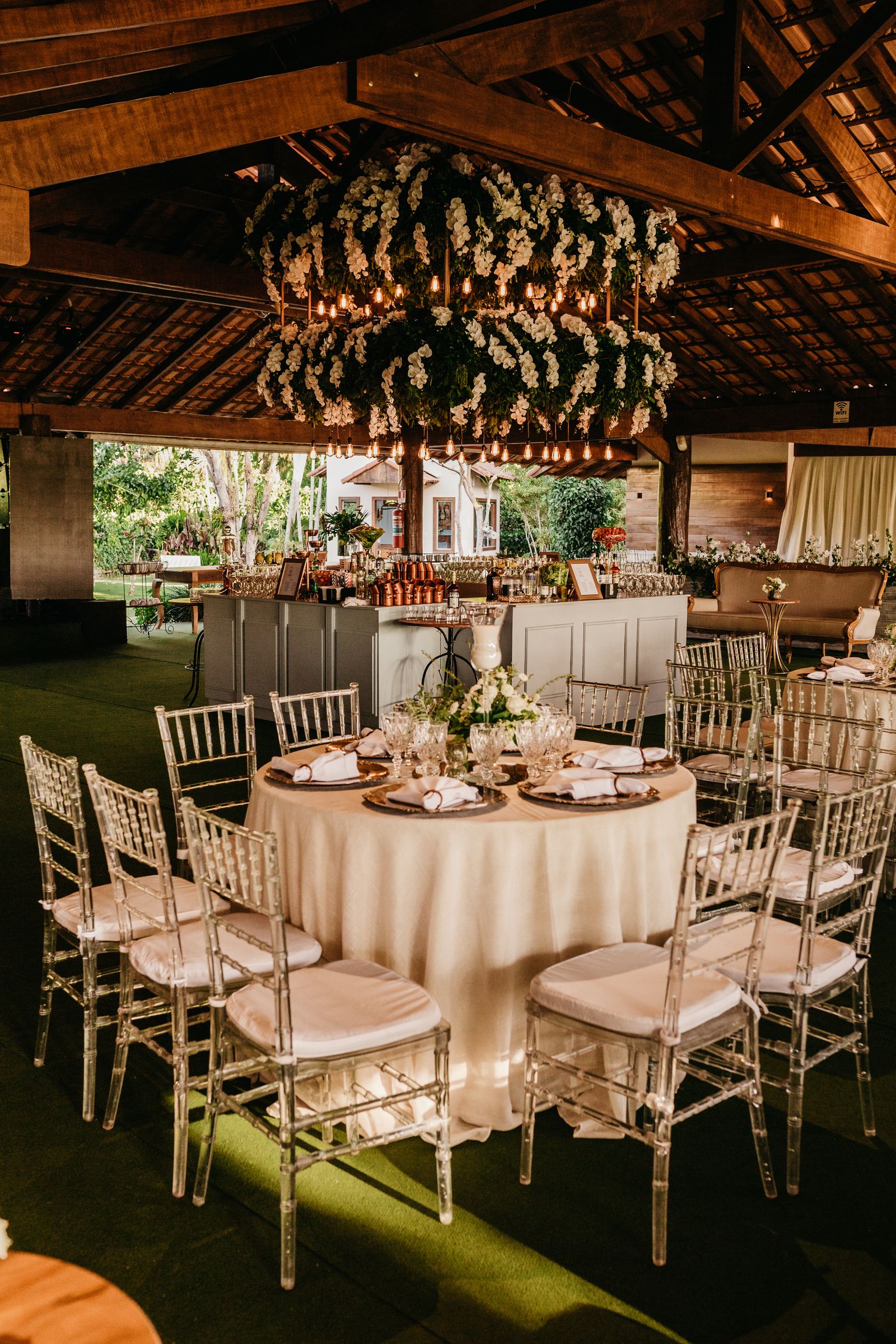Indoor reception hall with floral chandeliers