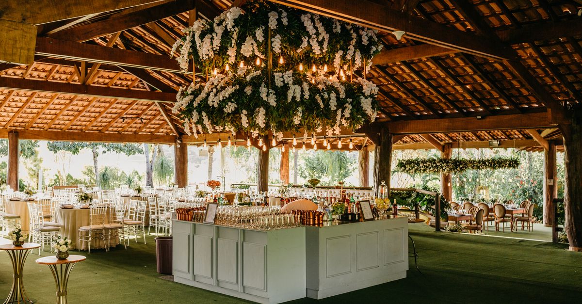 A Retro Summer Camp Wedding on the Lake with Botanical Patterns and Subtle Disney Details