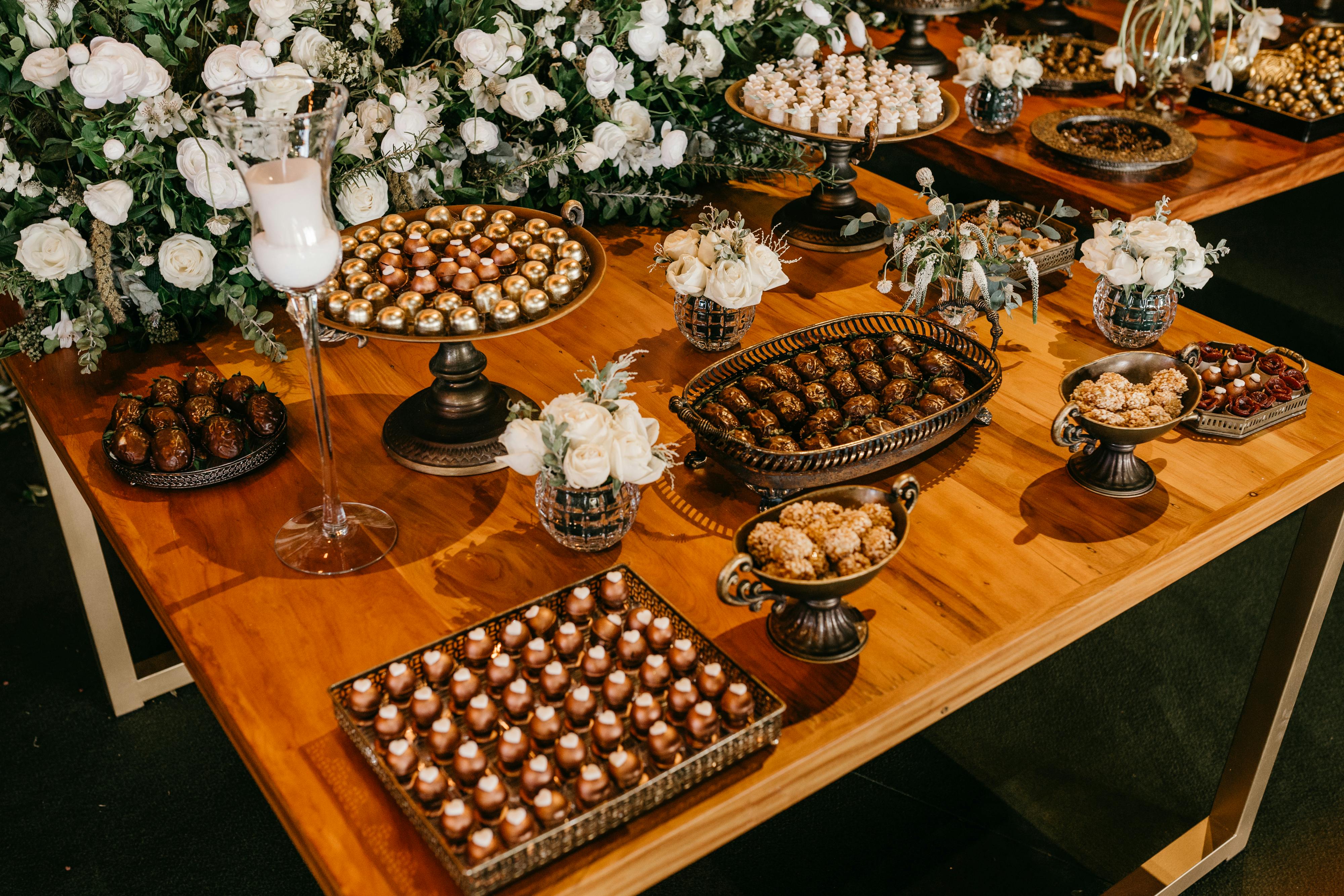 elegant table filled with various chocolate confectionery