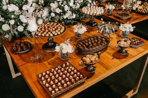 Free Elegant Table Filled With Various Chocolate Confectionery Stock Photo