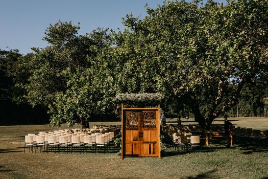 Brown Chairs on the Grass Field