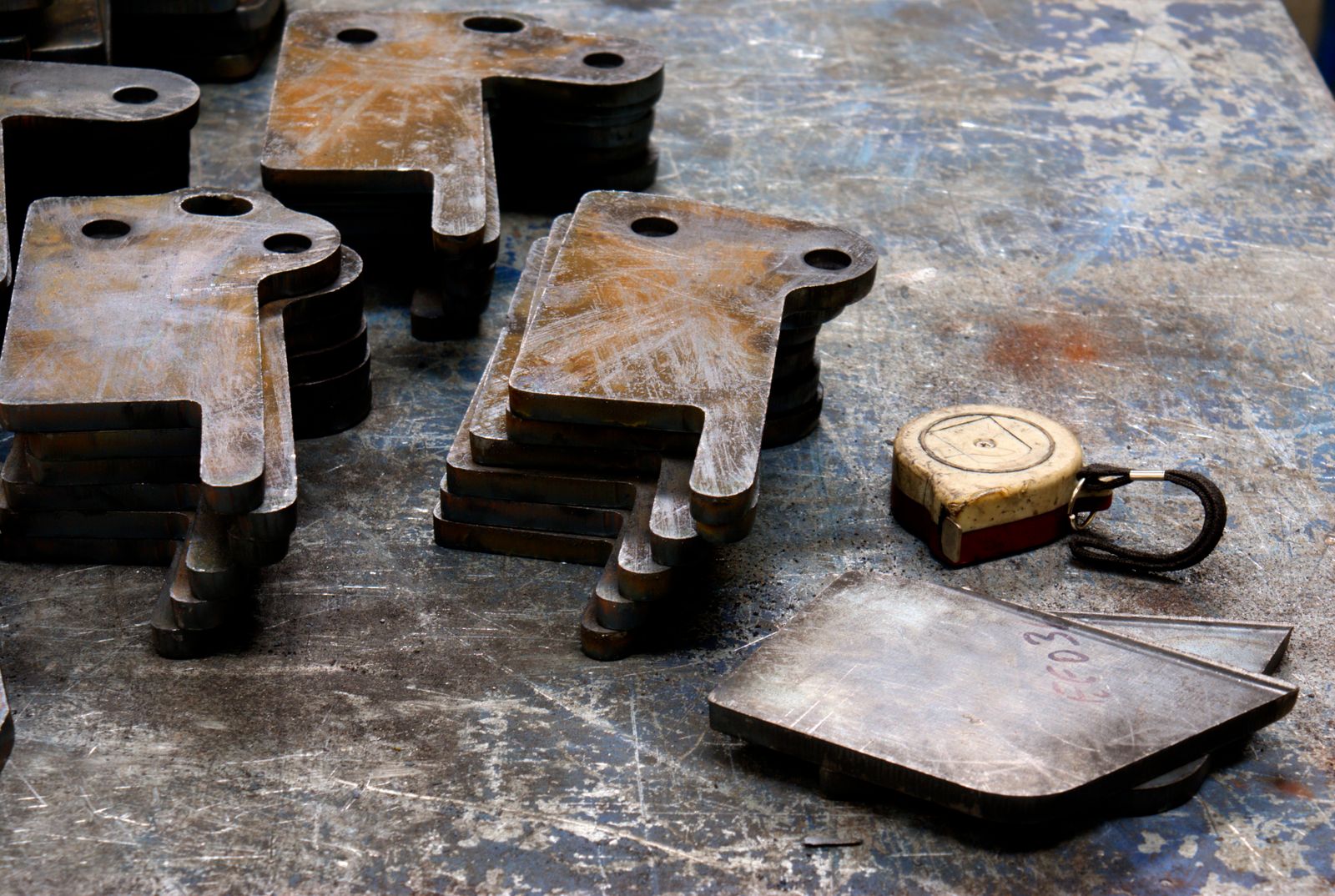 Stack of profile-cut steel plate parts