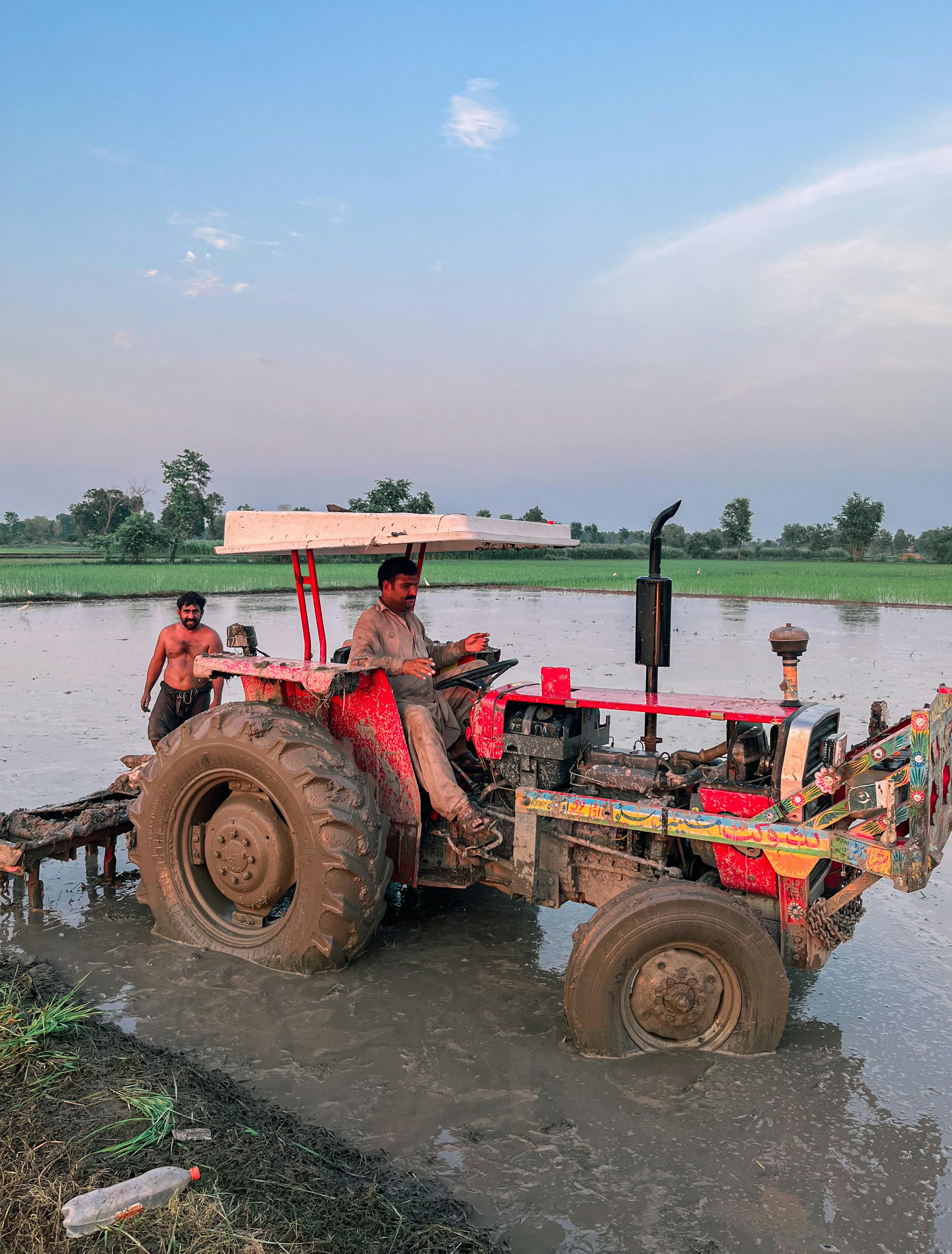 Tractor on a Paddy Field · Free Stock Photo