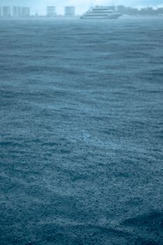 Serene seascape capturing moody ocean waves beneath an overcast sky, conveying tranquility.
