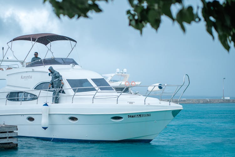 A Man Pulling A Boat Fender