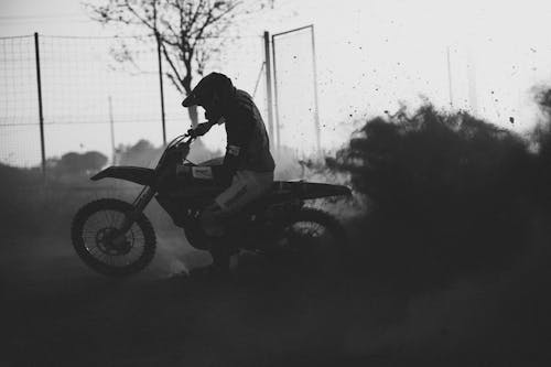 A Motocross Rider Leaving a Cloud of Dust