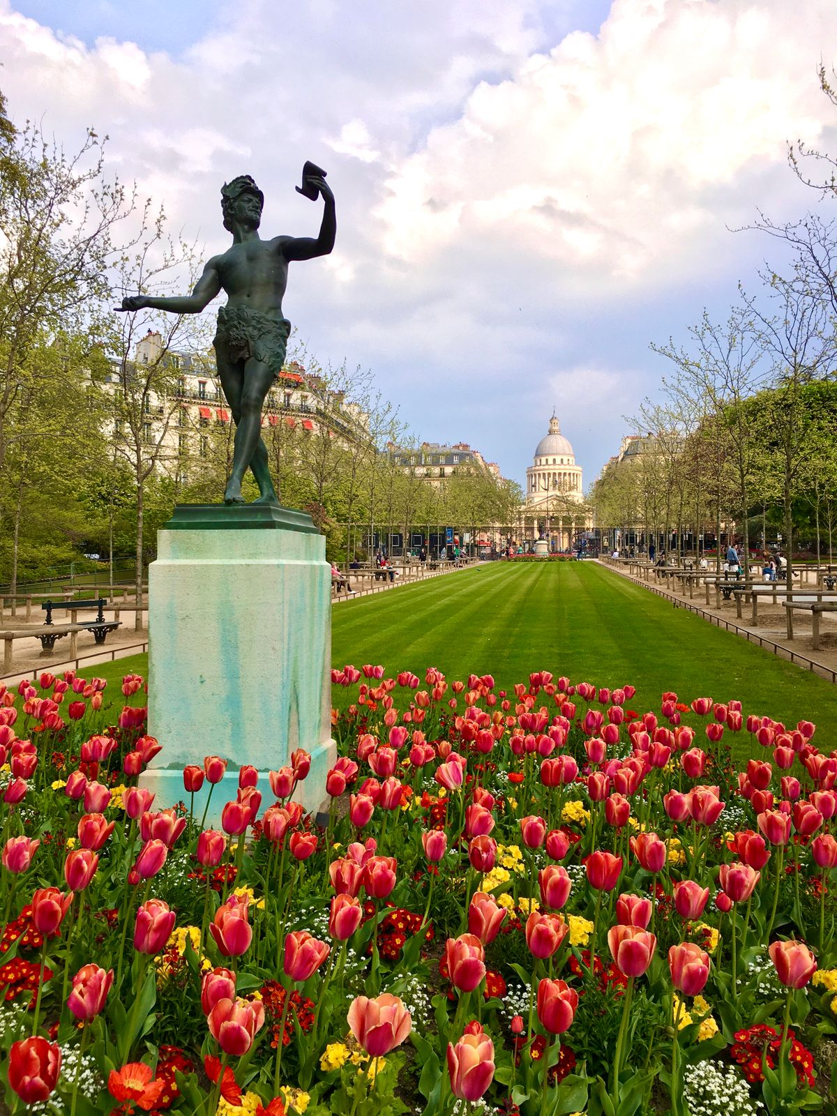 Flowerbeds and a statue in Luxembourg Gardens, Paris
