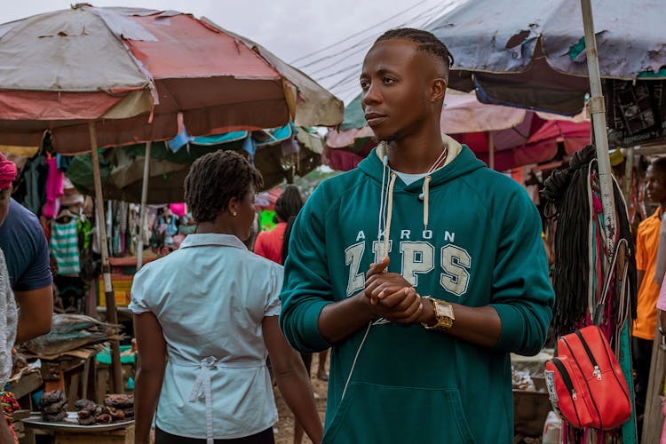 Man Wearing A Green Hoodie