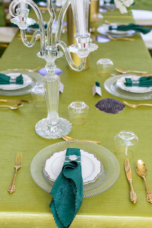 Elegant Table Setting on Gold Covered Table
