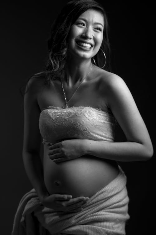 Free Grayscale Photograph of a Pregnant Woman Stock Photo