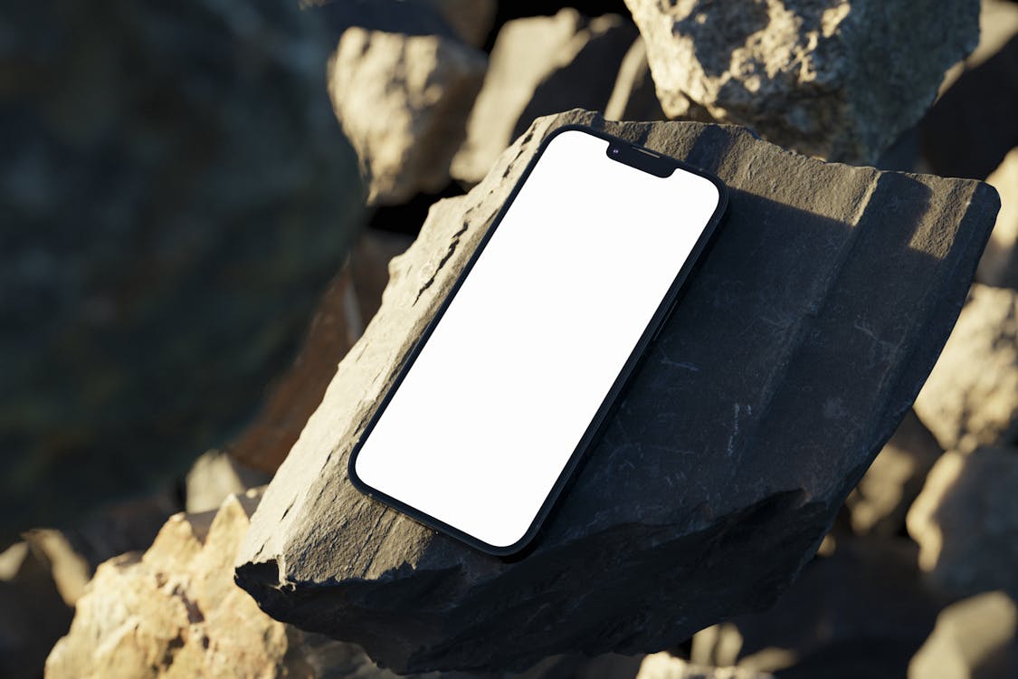 A Smartphone on a Rock · Free Stock Photo