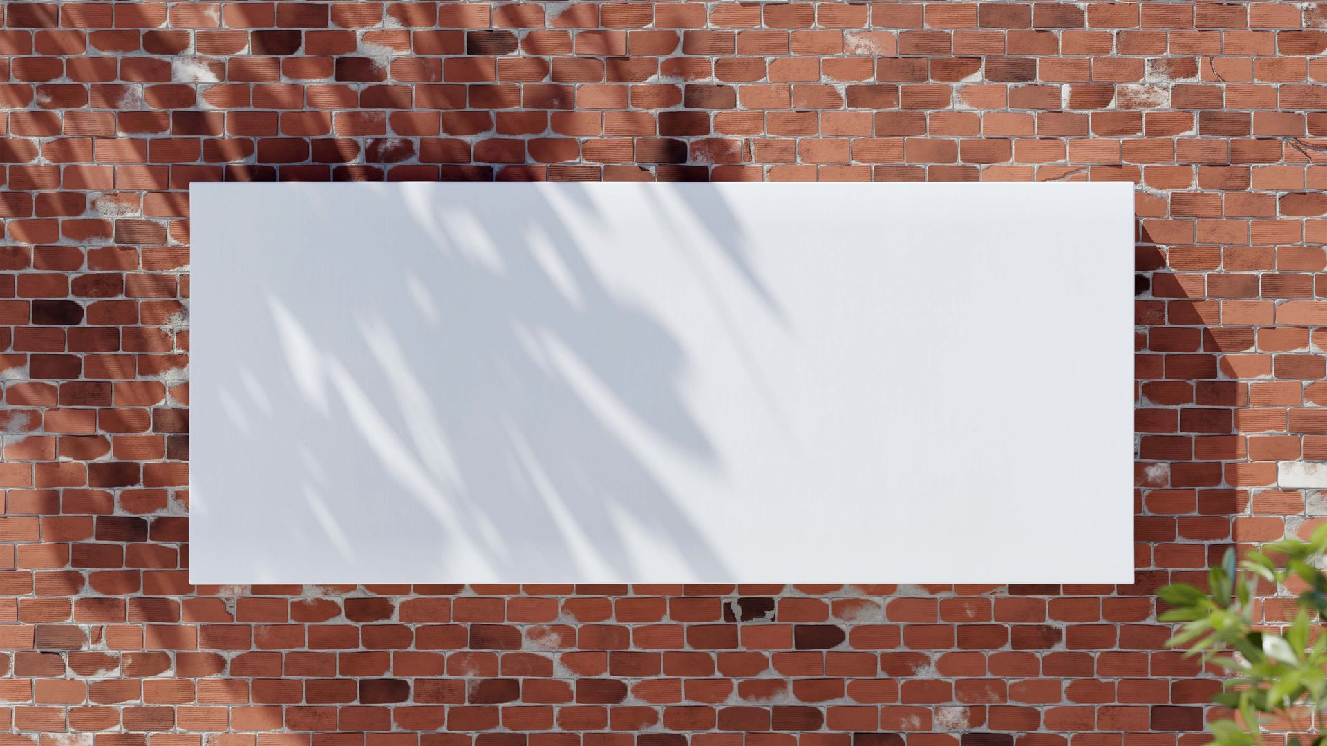 Panaflex: Exploring the Versatile Printing Material 3 Large blank white banner on a red brick wall with leafy shadows, perfect for mockup designs — panaflex