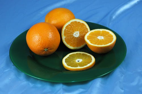 Darmowe zdjęcie z galerii z owoce cytrusowe, pokrojony, pomarańcze