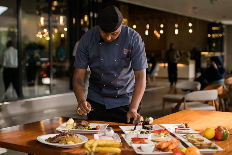 Chef Preparing A Dish 