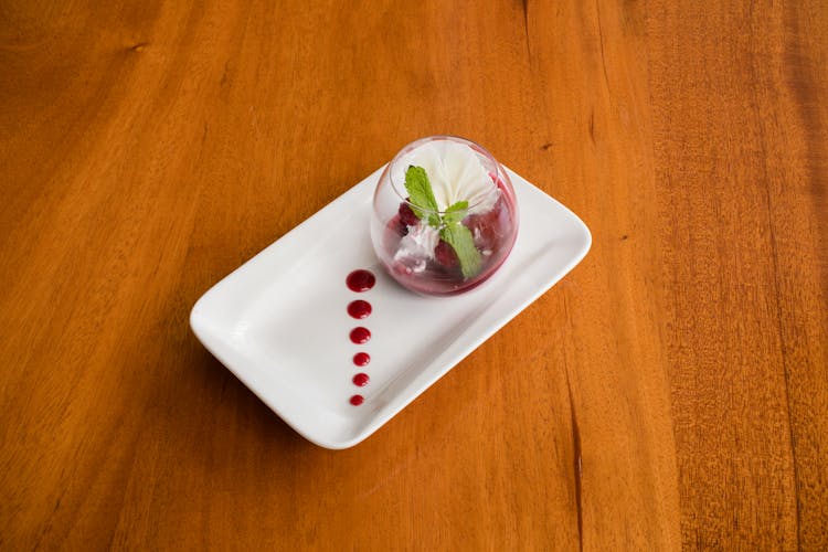 Dessert In A Glass Bowl On A White Tray