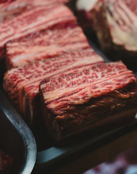 Close-up of fresh marbled beef ribs, perfect for grilling or barbeque, in Woollahra, NSW.