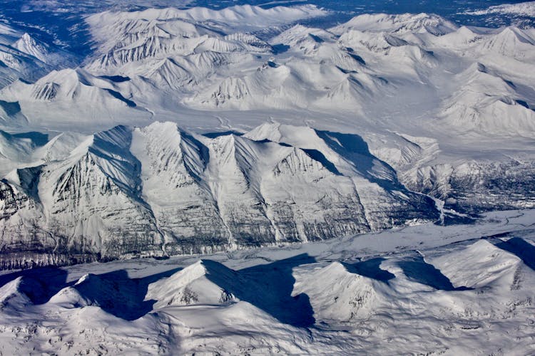 Snow Covered Mountains During Winter